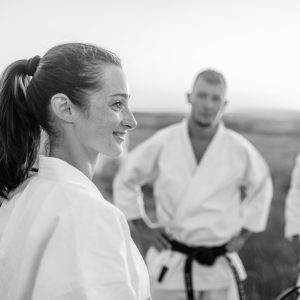 Male and Female Karate Student standing outdoors