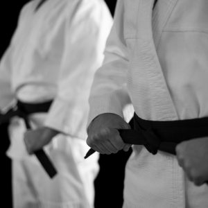Two karate students standing next to each other